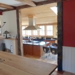 View of dining room into kitchen at Wind Whistle Farm